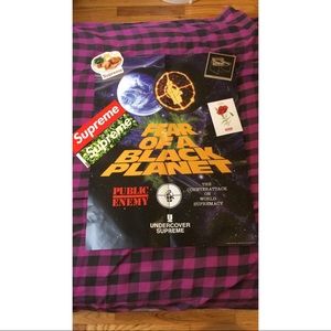 Supreme Public Enemy poster with stickers